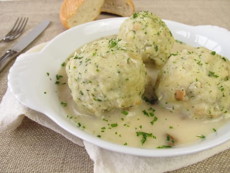 Bread dumplings with porcini mushroom sauce