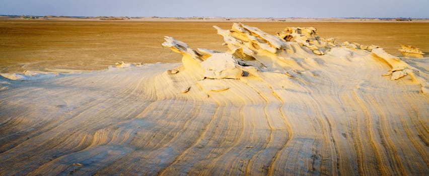 Sandstone formations in Abu Dhabi desert in United Arab Emirates