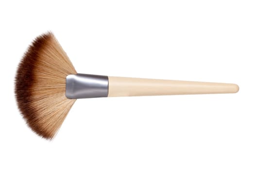 Closeup of a wooden new professional makeup brush isolated on a white background. Concept beauty. Macro photograph.