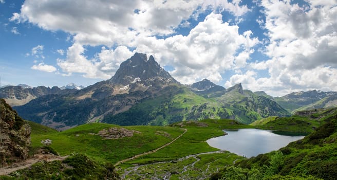 view of Pic du Midi Ossau and Ayous lake in the french Pyrenees mountains