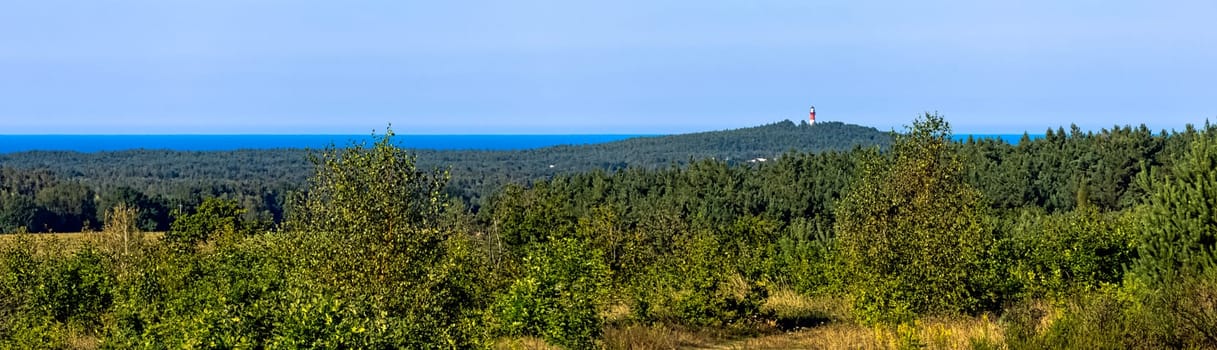 Panoramic view of Polish seacoast with lighthouse in background - Stilo, Pomerania, Poland