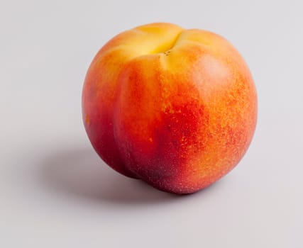 Single Nectarine on White Background