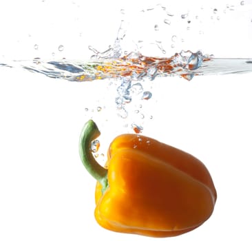 Orange Bell Pepper Dropping Into Water