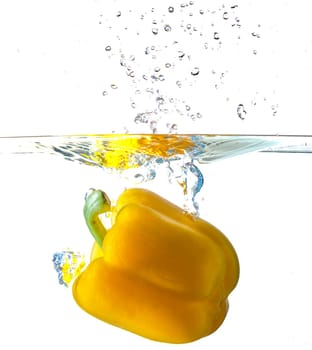 Yellow Bell Pepper Dropping Into Water