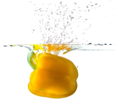 Yellow Bell Pepper Dropping Into Water