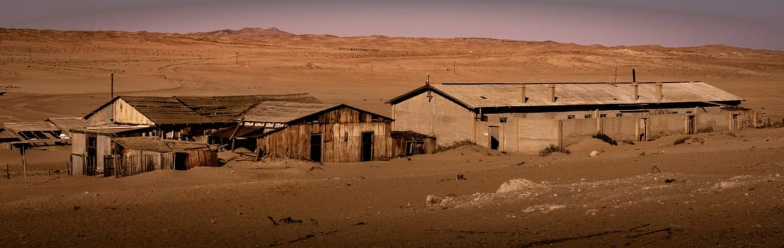 Abandoned buildings are left to rot in Kolmanskoppe, Namibia