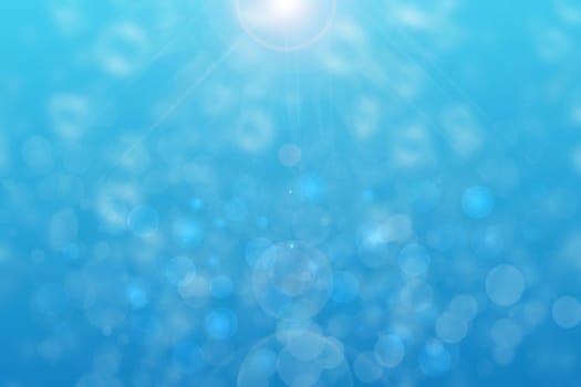 Abstract underwater illustration. Nice abstract gradient blue white lightening bokeh background with sunshine and rays and with circles from unterwater bubbles. Beautiful blue texture with space.
