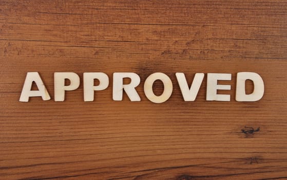 Term from wooden letters on old wooden board