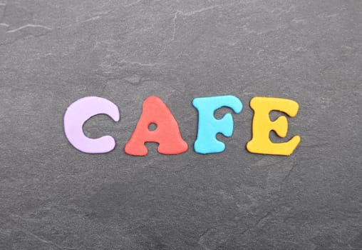 Term from colorful letters on slate board