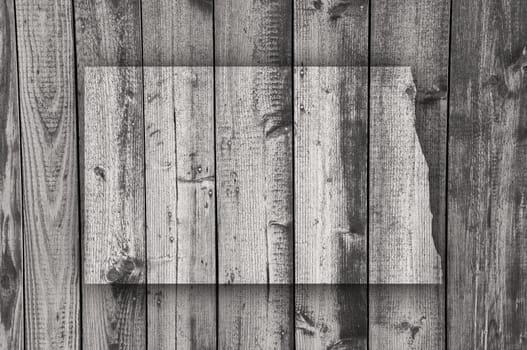 Map of North Dakota on weathered wood