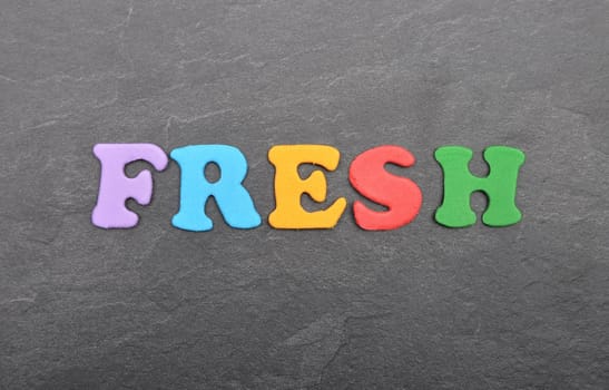 Term from colorful letters on slate board