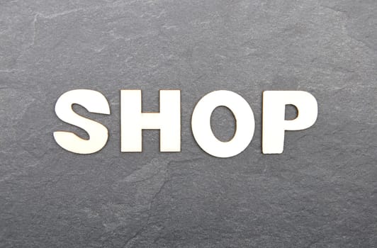 Term from wooden letters on slate board