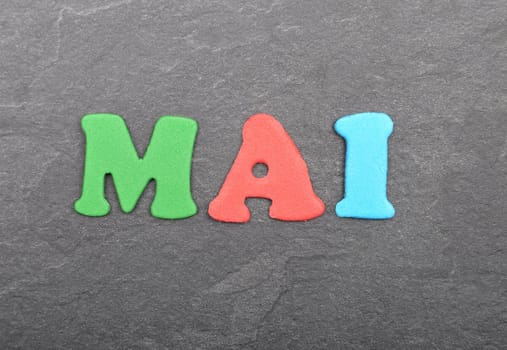 Term from colorful letters on slate board