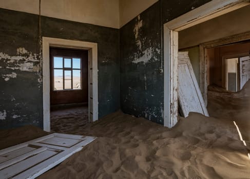 Sand has invaded and taken over these rooms in Kolmanskoppe, Namibia