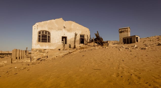 Abandoned buildings are left to rot in Kolmanskoppe, Namibia