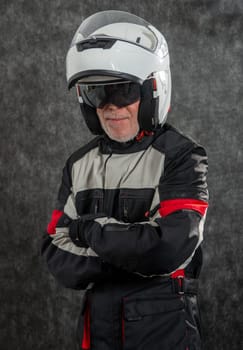 portrait of senior biker with a white helmet