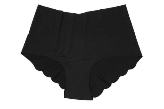 Underwear woman isolated. Close-up of a black seamless panties isolated on a white background. Useful for wearing under dark transparent dresses. Underwear fashion.