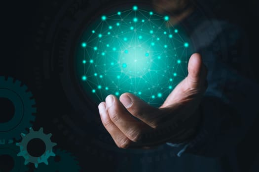 Hand of businessman holding icon for technology and energy concept.