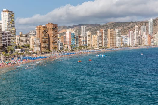 Aerial view of Benidorm city on Costa Blanca in Spain with skyscrapers. Mediterranean coast.