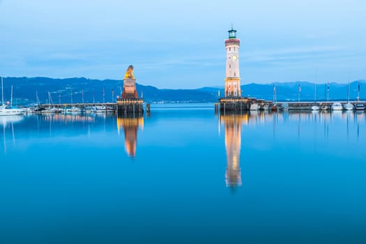 Night view of Lighthouse at harbour in Lindau, Lake Constance in Germany. Bodensee.