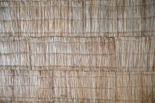 Background from straw material for roof coverings