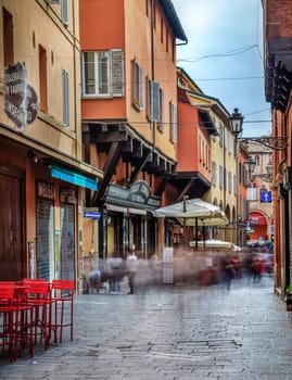Bologna, Italy, September 20, 2015: long exposure image of a busy commercial street in historic center of Bologna, Italy