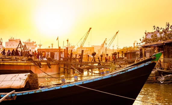 Chittagong, Bangladesh, December 22, 2017: Manual offloading of cargo from ships at the Karnaphuli River port in Chittagong, Bangladesh