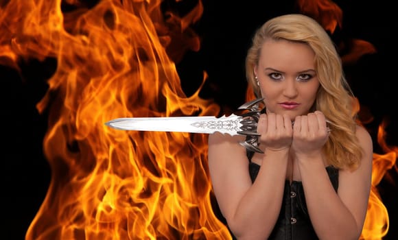 young blonde woman with a knife in the fire