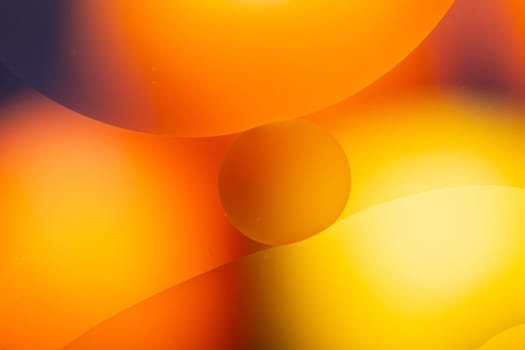 A Close-up water and oil abstract in a rainbow lighting effect
