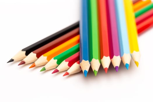 A wooden colored pencils of different colors on a white background