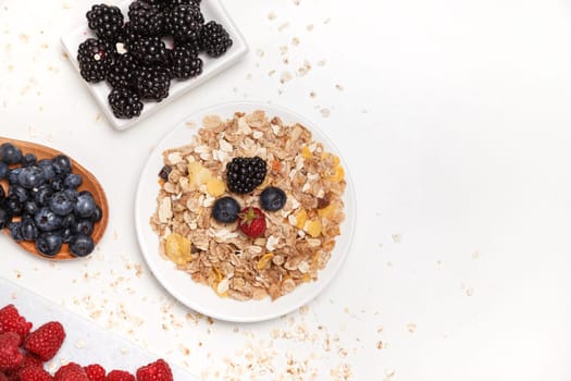 Healthy breakfast. Food cereal concept with fresh fruits isolated on white.