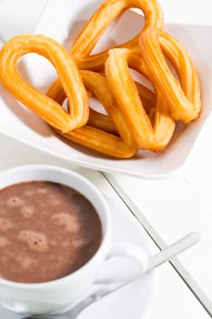 Typical Spanish dessert with chocolate with churros