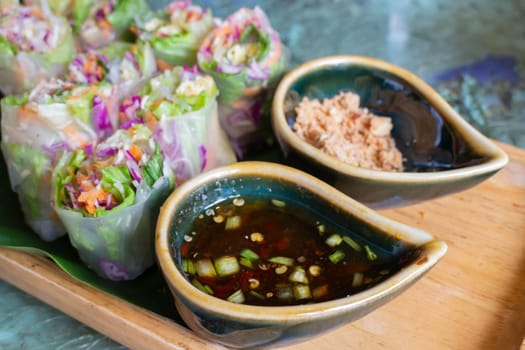 Healthy fresh vegetable spring rolls serving, stock photo
