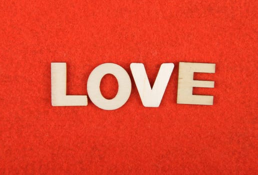 Term from wooden letters on felt