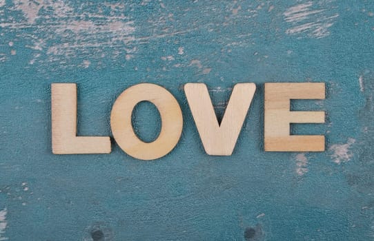 Term from wooden letters on weathered concrete