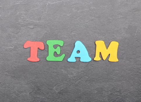 Term from colorful letters on slate board