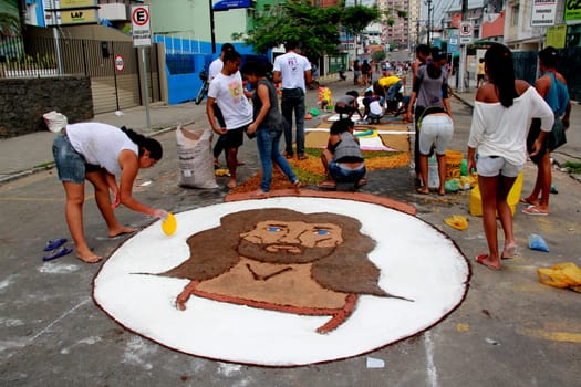 Itabuna, Bahia / Brazil - June 7, 2012: People are seen making traditional tapes during the Corpus Crist holiday festivities in Itabuna.