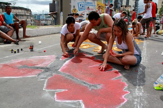 Itabuna, Bahia / Brazil - June 7, 2012: People are seen making traditional tapes during the Corpus Crist holiday festivities in Itabuna.