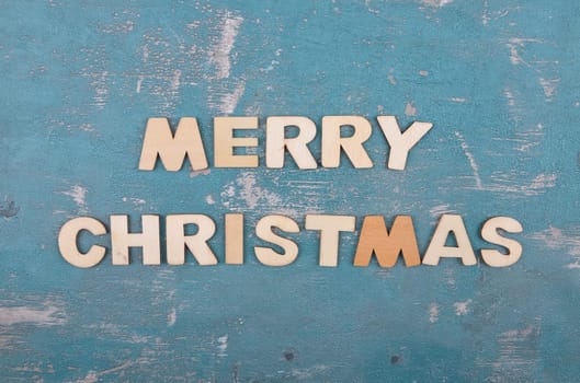 Term from wooden letters on weathered concrete