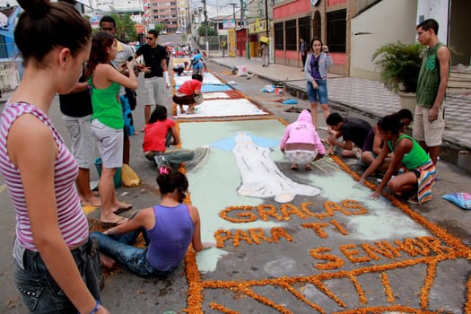 Itabuna, Bahia / Brazil - June 7, 2012: People are seen making traditional tapes during the Corpus Crist holiday festivities in Itabuna.