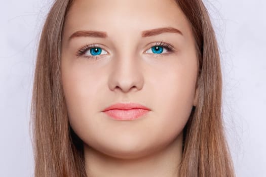Face of a woman with blue eyes