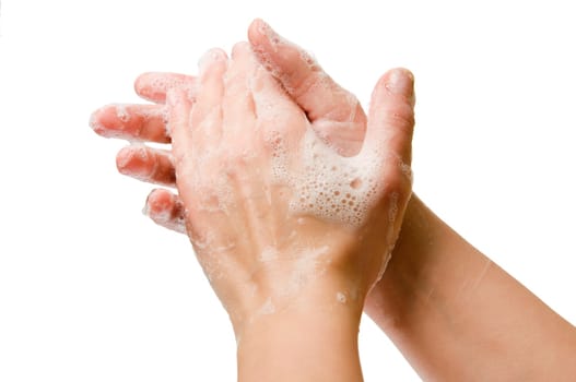 Lateral closeup with foamed hands on soap against white background.