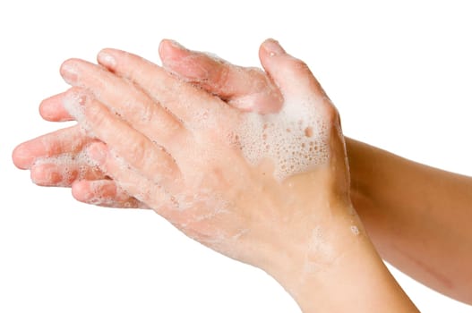 Lateral closeup with foamed hands on soap against white background.