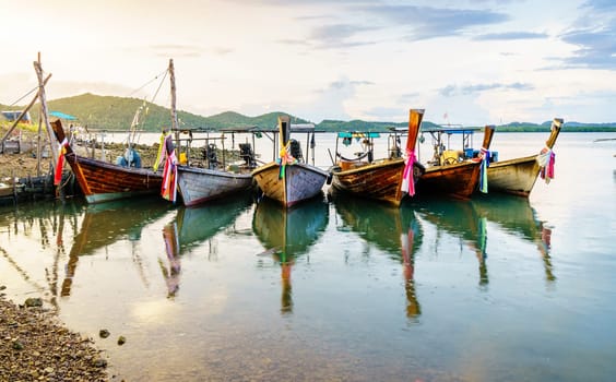Traditional Thai long tail boats at a fishing village on Ko Yao Yai island
