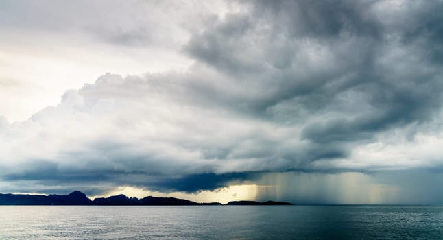 Rain storm and low clouds over the Andaman Sea off Krabi coast in Thailand