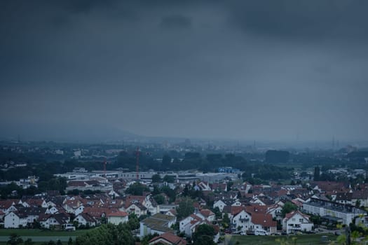 Dark clouds overcast over a german village