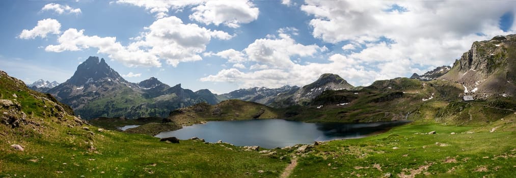 Pic du Midi Ossau and Ayous lake in the french Pyrenees mountains