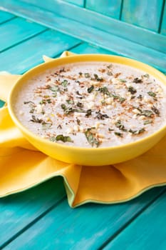 Jellied meat, traditional russian cuisine. Teal wooden background. Vertical image