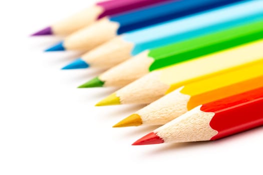 A Colorful color wooden pencils on a white background