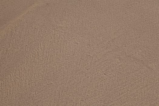 Texture of sand as background from the beach